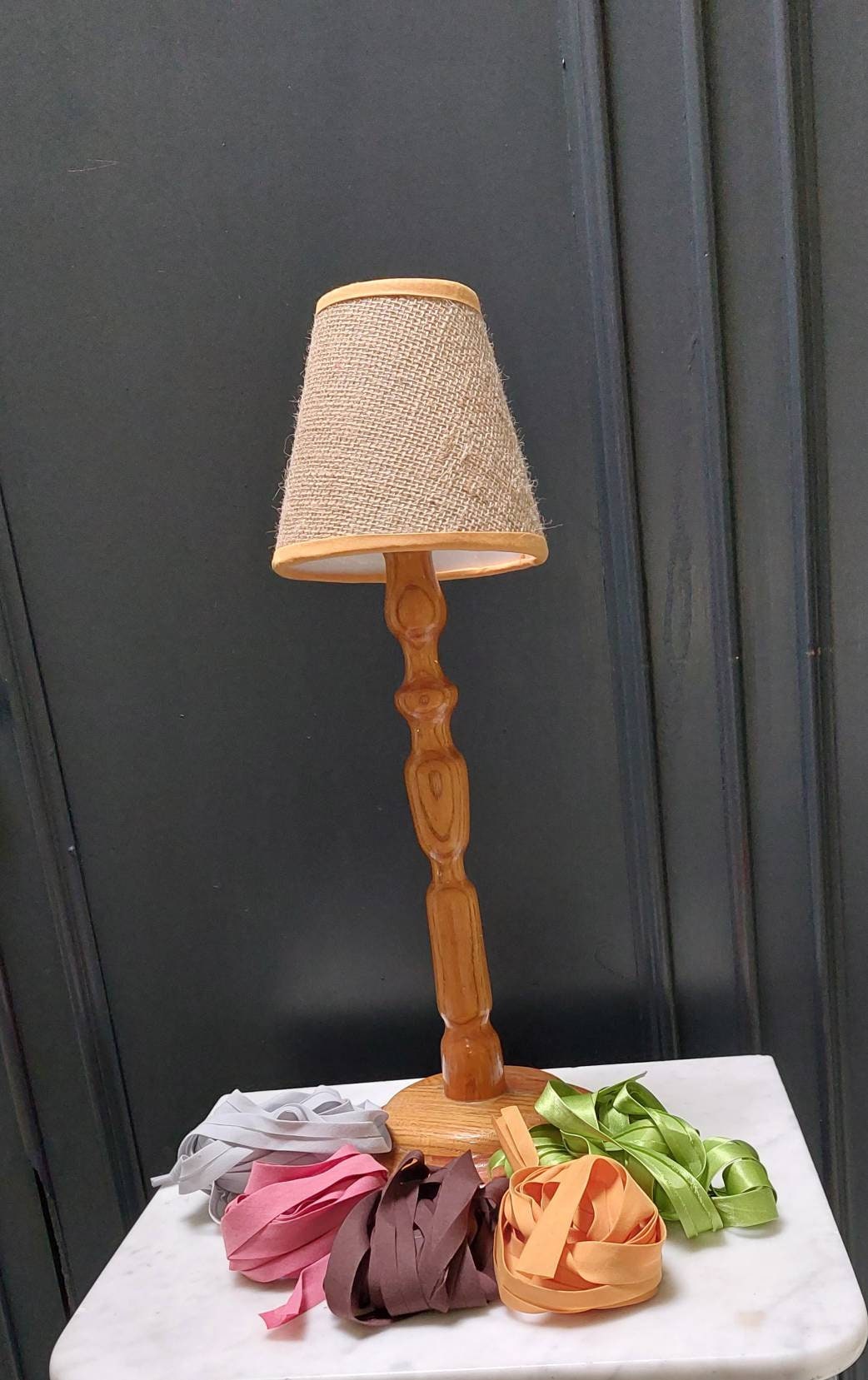 Hessian Candle Clip Lampshade with rust trim.