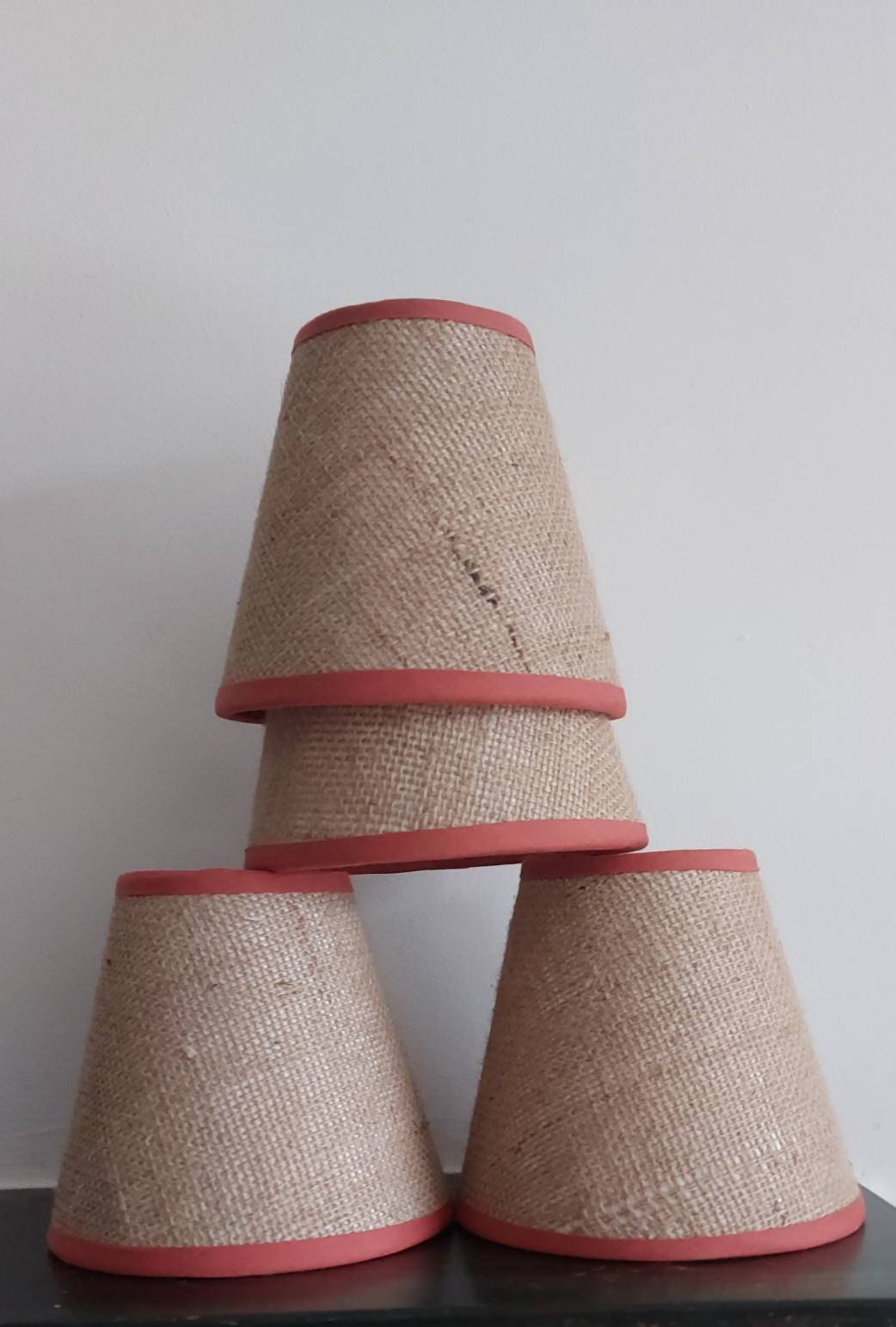 Hessian Candle Clip Lampshade with rust trim.