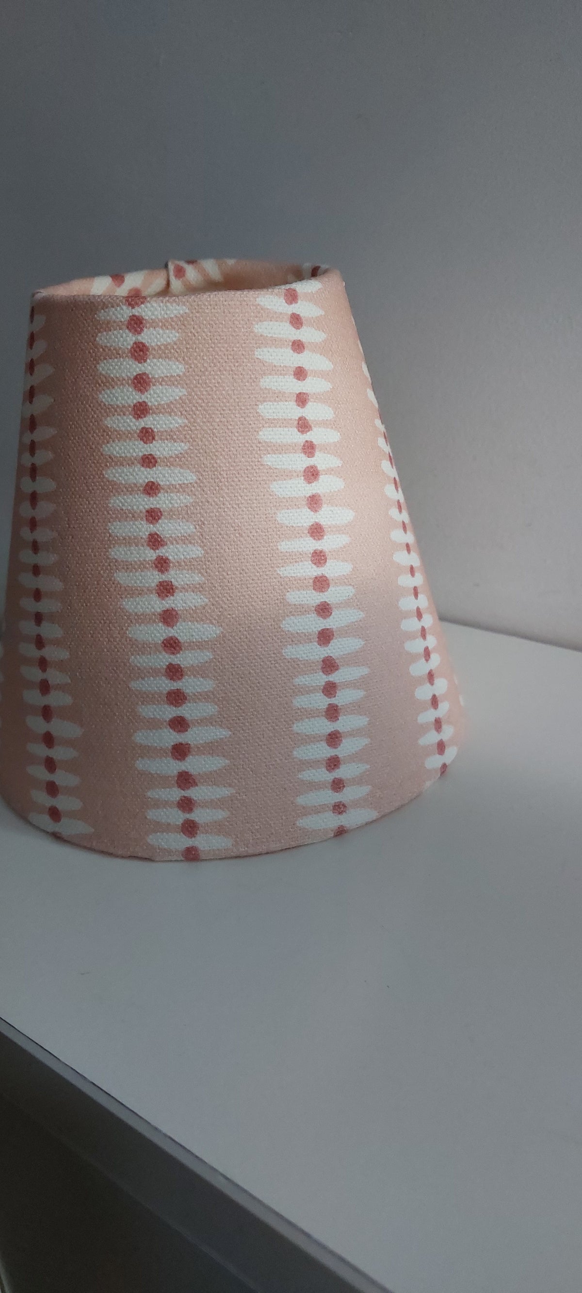 Pink candle clip lampshade.