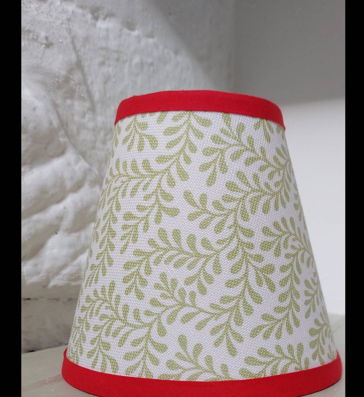 Colefax and Flower Olive Green Leaves Candle Clip Lampshade with red trim